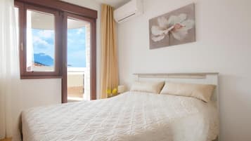 Family Apartment | 1 bedroom, desk, free WiFi, bed sheets