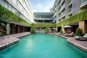 2 outdoor pools, open 9:00 AM to 7:00 PM, pool loungers