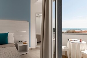 Deluxe Room, 1 Queen Bed, Sea View, Tower | In-room safe, free WiFi, bed sheets