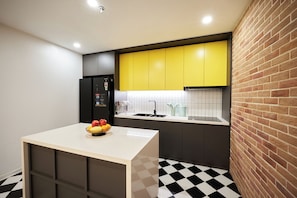 Premium Queen City View | Shared kitchen | Full-size fridge, microwave, cookware/dishes/utensils - Wilque Hotel Hanoi (Hanoi)