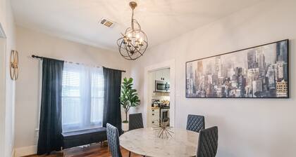 Charming private house sleeps 4 with a large fenced yard, fast WiFi, smart TVs, and ample parking—near the Heights & Downtown. Features a primary king bed for a comfortable stay.