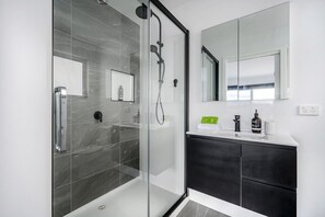 Shower, hair dryer, shampoo