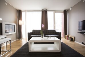 Apartament empresarial | 1 dormitori, planxa i posts de planxar, wifi gratuïta i roba de llit 