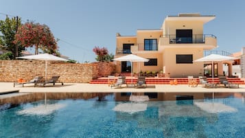 Outdoor pool, pool umbrellas, pool loungers