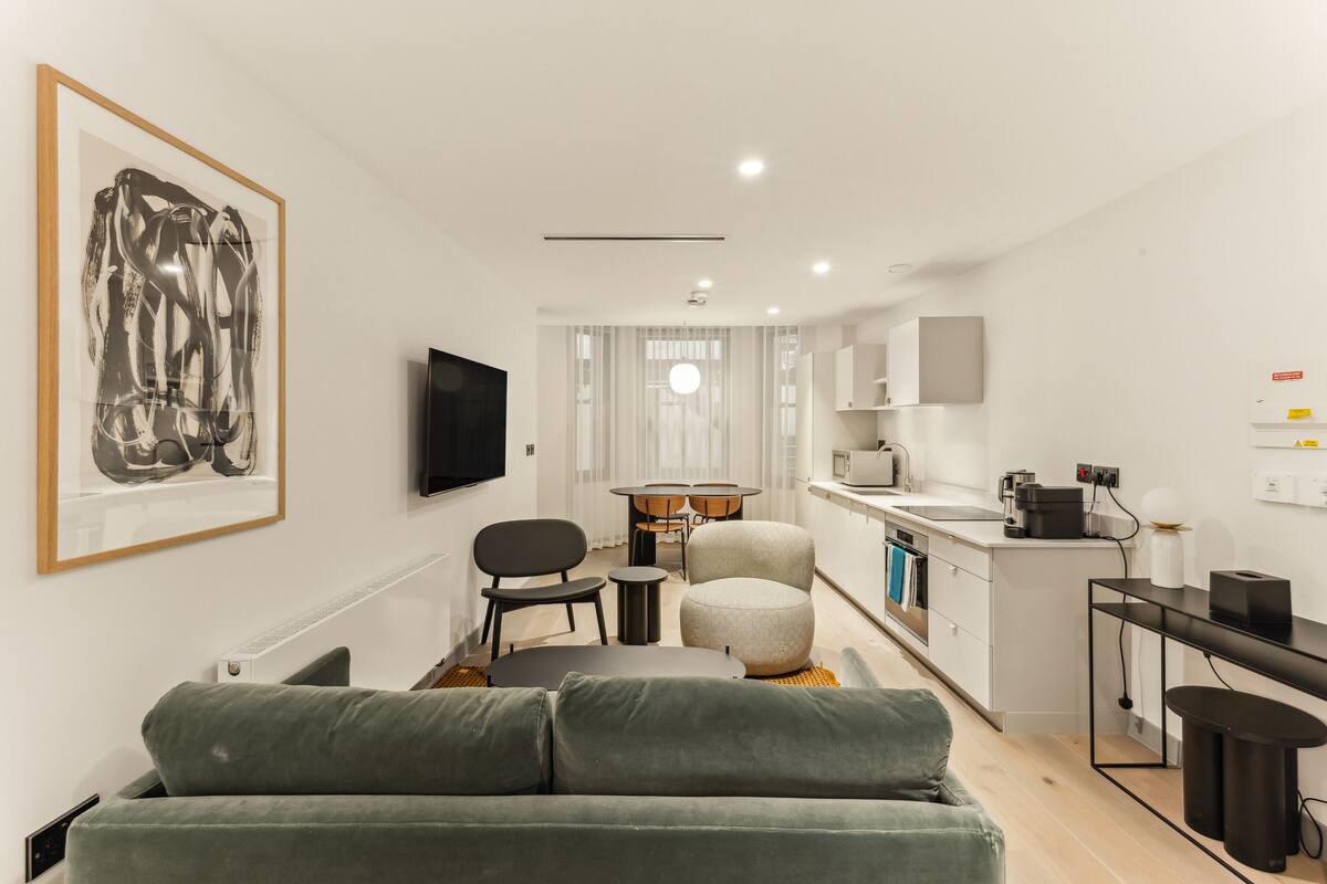 The Executive Three Bedroom Suite | Living area | Flat-screen TV, stereo