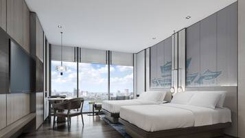Ein modernes Schlafzimmer mit Stadtblick, einem Essbereich und einem großen Fenster.