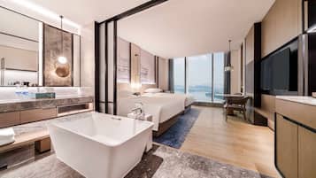 Premium bedding, down comforters, minibar, in-room safe