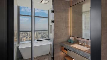 Separate bathtub and shower, rainfall showerhead, designer toiletries