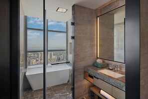 Separate bathtub and shower, rainfall showerhead, designer toiletries