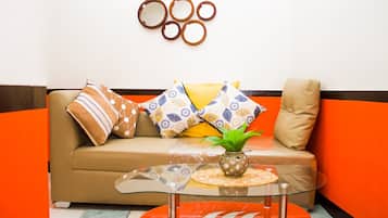 Signature Condo, 1 Bedroom | Living room | 49-inch Smart TV with digital channels, Netflix, streaming services