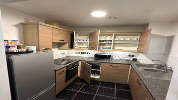 Apartment | Private kitchen | Fridge, microwave, oven, stovetop