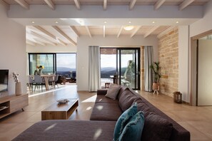 Executive Villa | Living area | 40-inch Smart TV with cable channels, Netflix, streaming services - Argyrie Villas (Kissamos)