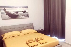 2 habitaciones, tabla de planchar con plancha, wifi y ropa de cama