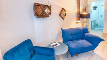 Apartment | Living area | 37-inch flat-screen TV with digital channels