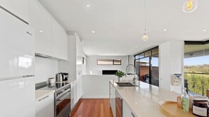 Coffee/tea maker, fridge, microwave, oven