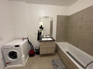 Bidet, towels, soap, shampoo