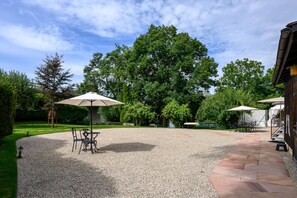 Private beach, black sand, sun-loungers, beach umbrellas