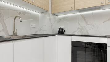 Apartment, 1 Bedroom, Sauna | Private kitchen | Dishwasher, cookware/dishes/utensils