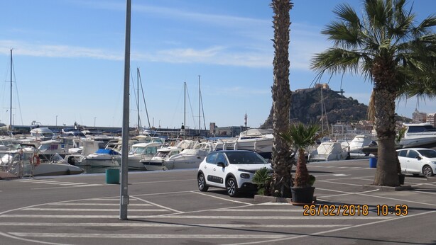 A marina with boats docked, a white car parked, and palm trees. - Casa Bougainvillea
Relax by the pool, it is yours  for the length of your stay (Lorca)