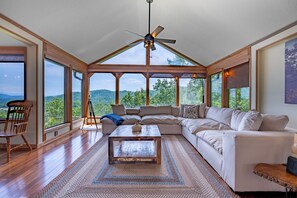 Smart TV, fireplace, table football, books