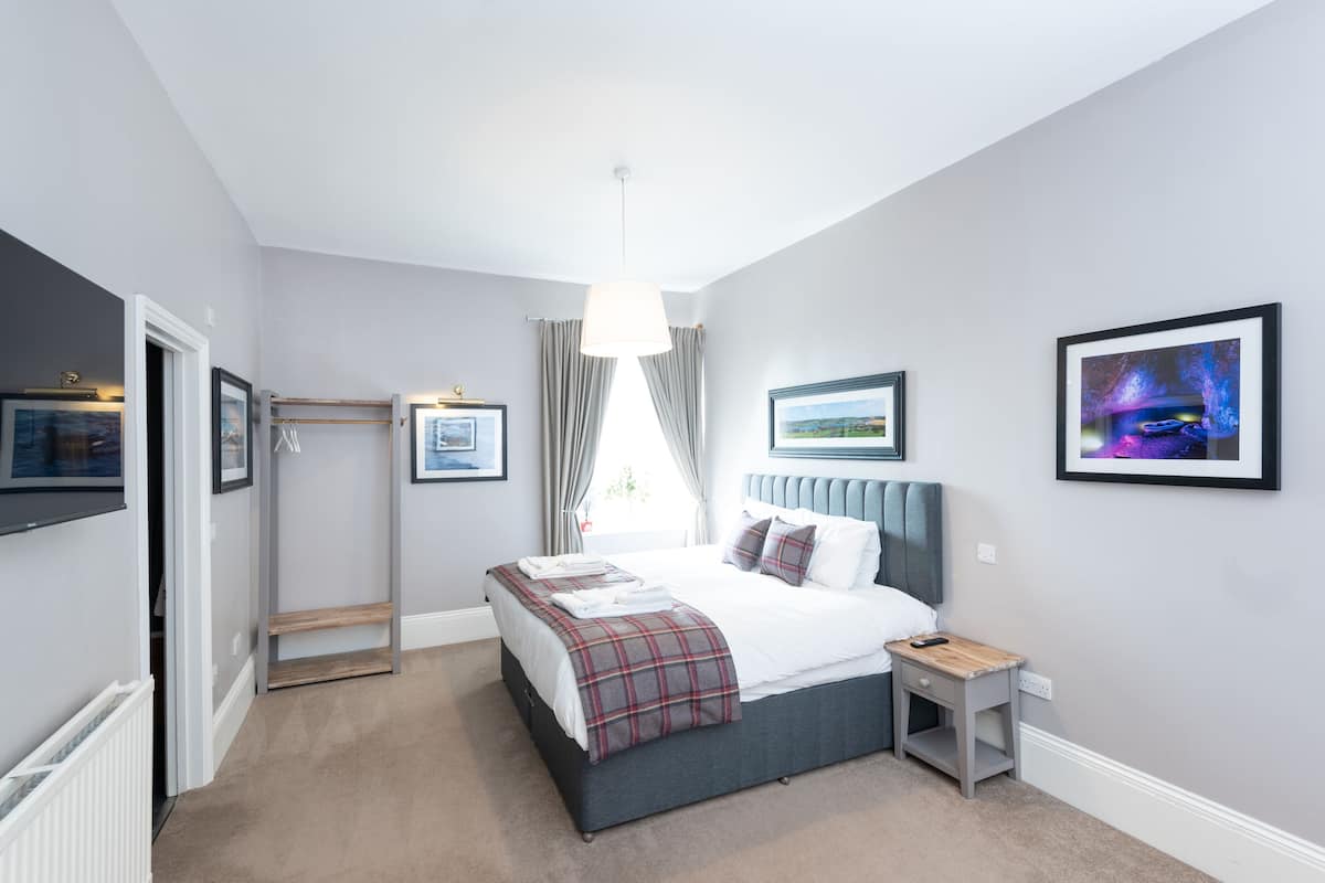 Family Room | 1 bedroom, desk, blackout drapes, iron/ironing board