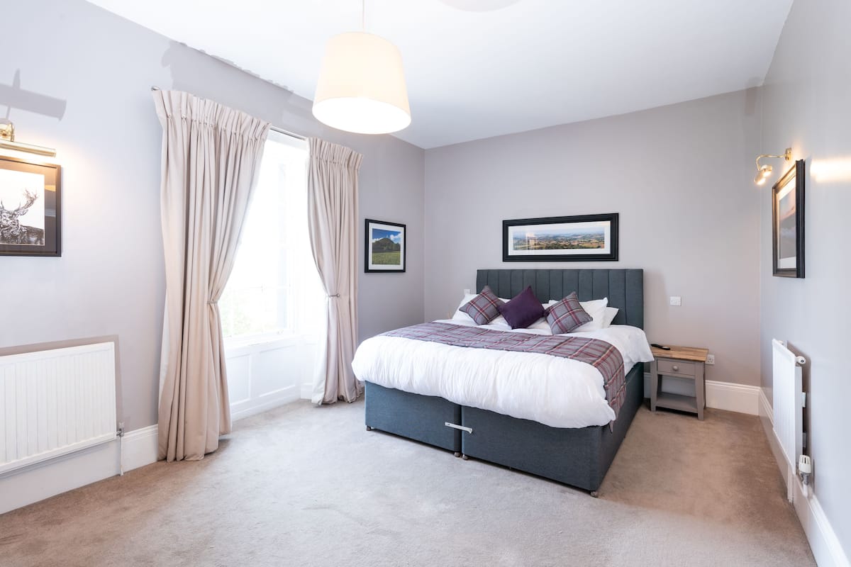 1 bedroom, desk, blackout drapes, iron/ironing board
