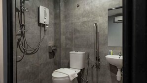 A modern bathroom with a toilet, bidet, and shower. - Chariton Hotel Bagan (Butterworth)
