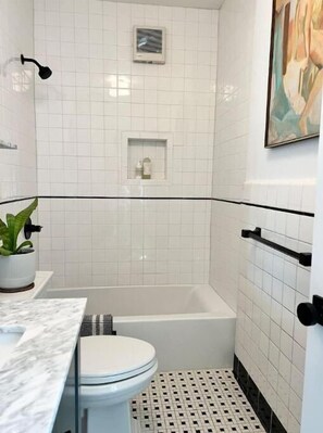 Hair dryer, towels, soap, shampoo