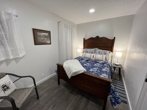 Cozy and quiet bedroom with built in storage.