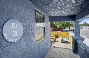 A building with a sign reading "Blue 101 Bungalow."