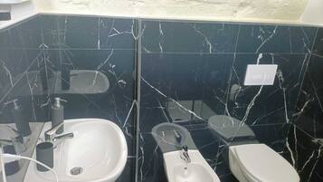 Deluxe-Zimmer | Badezimmer