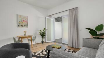 Executive Studio | Living area | 54-inch Smart TV with digital channels