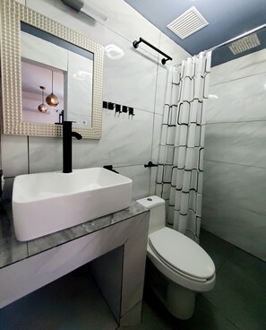 Shower, towels, soap, shampoo