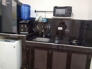 Fridge, microwave, cookware/dishes/utensils
