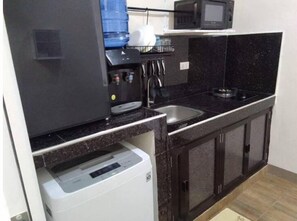 Fridge, microwave, cookware/dishes/utensils