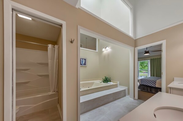 Shower, hair dryer, towels, shampoo