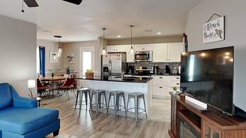 House, Multiple Beds, Balcony, Garden View | Living area | TV