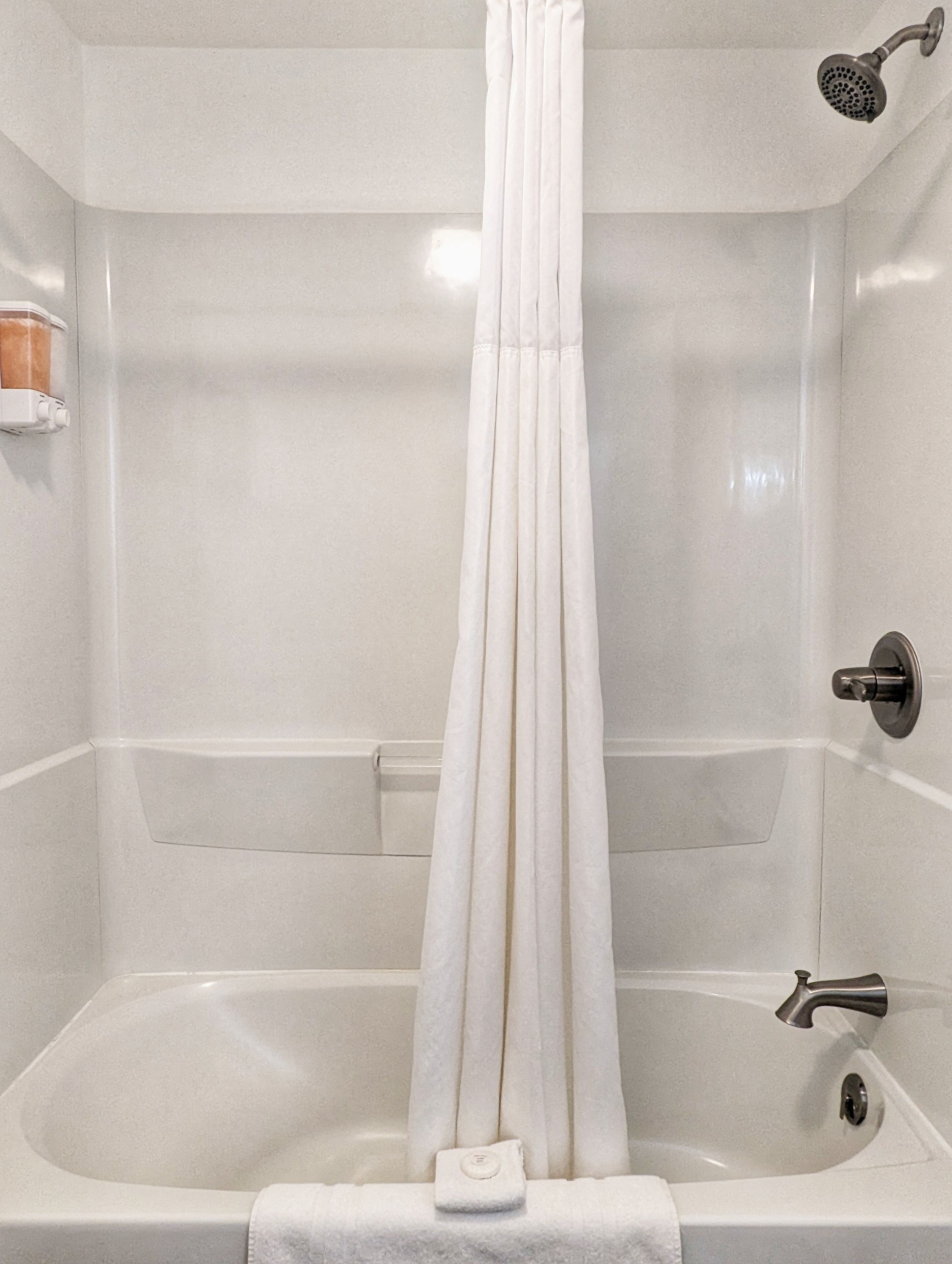 Hair dryer, towels, soap, shampoo