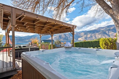 Lake views, hot tub, movie room w/ arcade games, EV charger