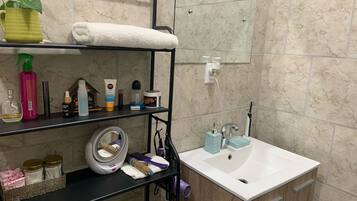 Romantic Apartment | Bathroom | Shower, rainfall showerhead, free toiletries, hair dryer