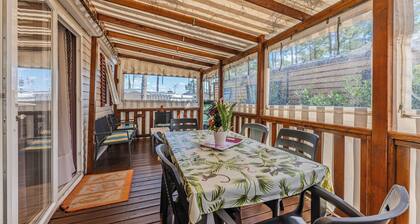 Mobile Home 'Les Dunes De Contis' avec piscine partagée, terrasse privée et climatisation