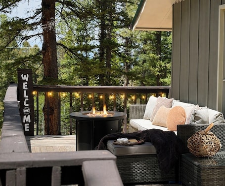 Terrace/patio. The Den- Forest Cabin Retreat