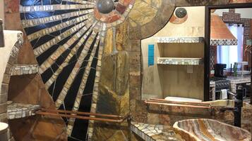 Oceanview Guesthouse, Angelito studio apartment | Bathroom | Shower, rainfall showerhead, towels, soap