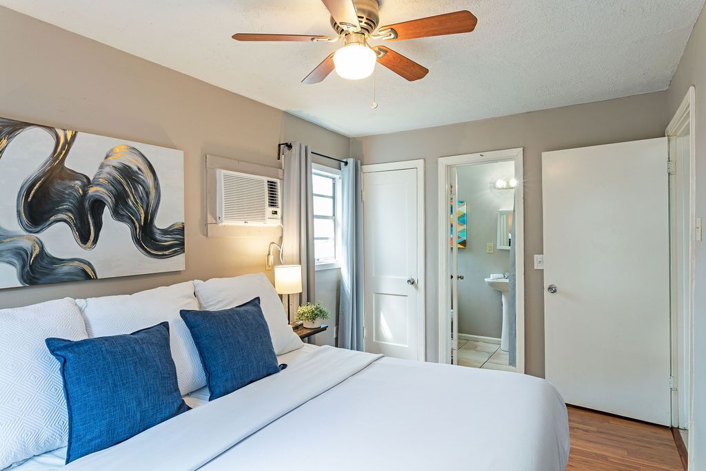 1 bedroom, desk, iron/ironing board, travel crib