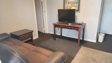 Classic Studio | Living area | 42-inch LED TV with cable channels