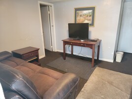 Classic Studio | Living area | 42-inch LED TV with cable channels