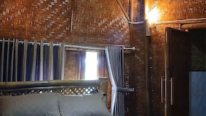 A room with a bed, a window with curtains, and a woven ceiling. - Bale Gantar (Sembalun Lawang)