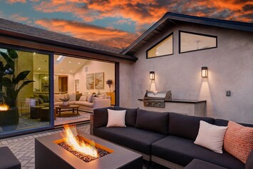 With sliding doors and built in BBQ, guests can take in the outdoors both inside and out!