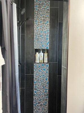 Shower, hair dryer, towels, soap