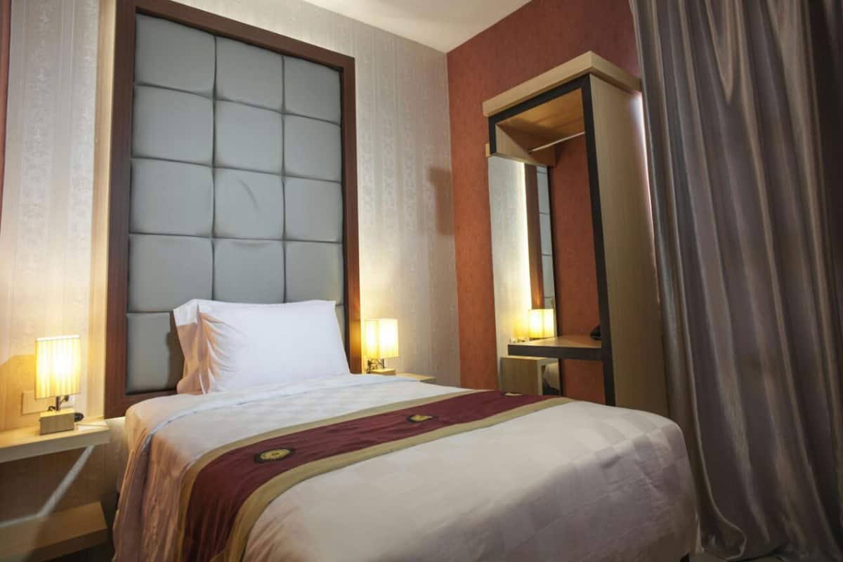 Habitación superior (Single) | 1 dormitorio, escritorio, wifi gratis y ropa de cama